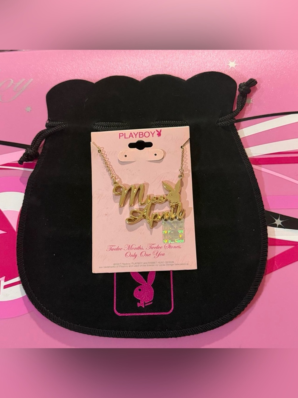 Playboy miss April gold necklace NWT